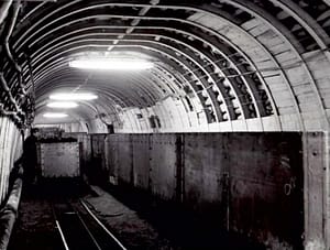 Black and white image of a mining tunnel for Kent Mining Museum at Betteshanger Country Park in Deal